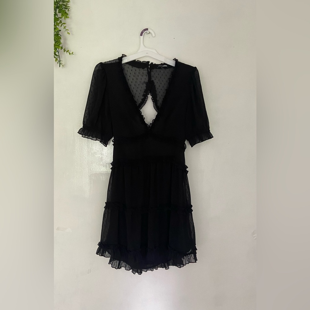 Fashion Nova Black Mini Dress Sz M Swiss Dot with a cutout in the back